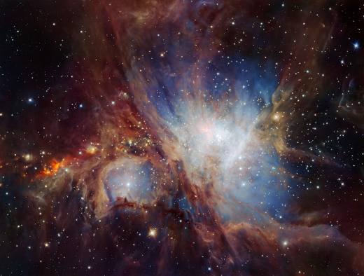 Photo de la grande nébuleuse d'Orion prise en infrarouge par le VLT. Puisqu'elle n'est pas prise dans le domaine visible, cette photo est assez différente de celle que j'avais utilisée la semaine dernière : elle est brune et blanche plutôt que majoritairement rose, et on voit d'autres détails sur la façon dont le gaz se répartit à l'intérieur.