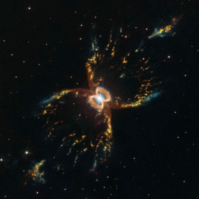 Photo (prise par le télescope spatial Hubble) de la nébuleuse australe du crabe. Autour du point lumineux central (il y a en fait d'ailleurs deux objets à cet endroit-là), on peut voir quelques couches de gaz formant vaguement une carapace, et des extensions qui peuvent faire penser aux pattes et aux pinces de l'animal. Sauf qu'il n'y a que quatre pattes/pinces ici, ce qui est un peu peu pour un crabe.