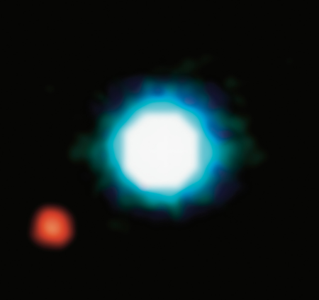 Photo prise par le VLT (et qui illustre présentement la page Wikipédia dédiée aux exoplanètes) de 2M1207 b, une des rares exoplanètes découvertes directement au télescope (en l'occurrence en infrarouge plutôt qu'en lumière visible, mais le principe est le même). La planète est au moins aussi grosse que Jupiter (et au moins trois fois plus lourde), et à peu près aussi éloignée de son étoile que Pluton ne l'est du Soleil : autant dire qu'on a peu de chances d'y trouver de la vie. Et cette image ne nous donne pas non plus énormément de détails : on voit globalement au centre une grosse boule blanchâtre aux contours cyan, l'étoile, et plus bas à gauche une boule plus petite encore plus floue mais de couleur rouge, la planète.