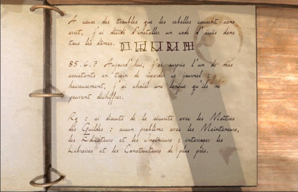 Capture d'écran du jeu de Riven (trouvée sur Mystpedia) dans laquelle on voit une page du journal de Gehn (techniquement, il s'agit plus d'un classeur que d'un journal, vus les anneaux qui tiennent les pages entre elles) que l'on trouve dans son laboratoire. Je ne vais pas retranscrire le texte qui y est écrit, qui aurait peu d'intérêt dans le contexte de ce thread, mais on voit clairement, vers le haut de la page, à côté de ce qui ressemble à une tache laissée par un verre, une suite de cinq symboles (déterminés aléatoirement et qui changent d'une partie sur l'autre, d'ailleurs) qui représentent un code d'accès écrit avec des chiffres riveniens.